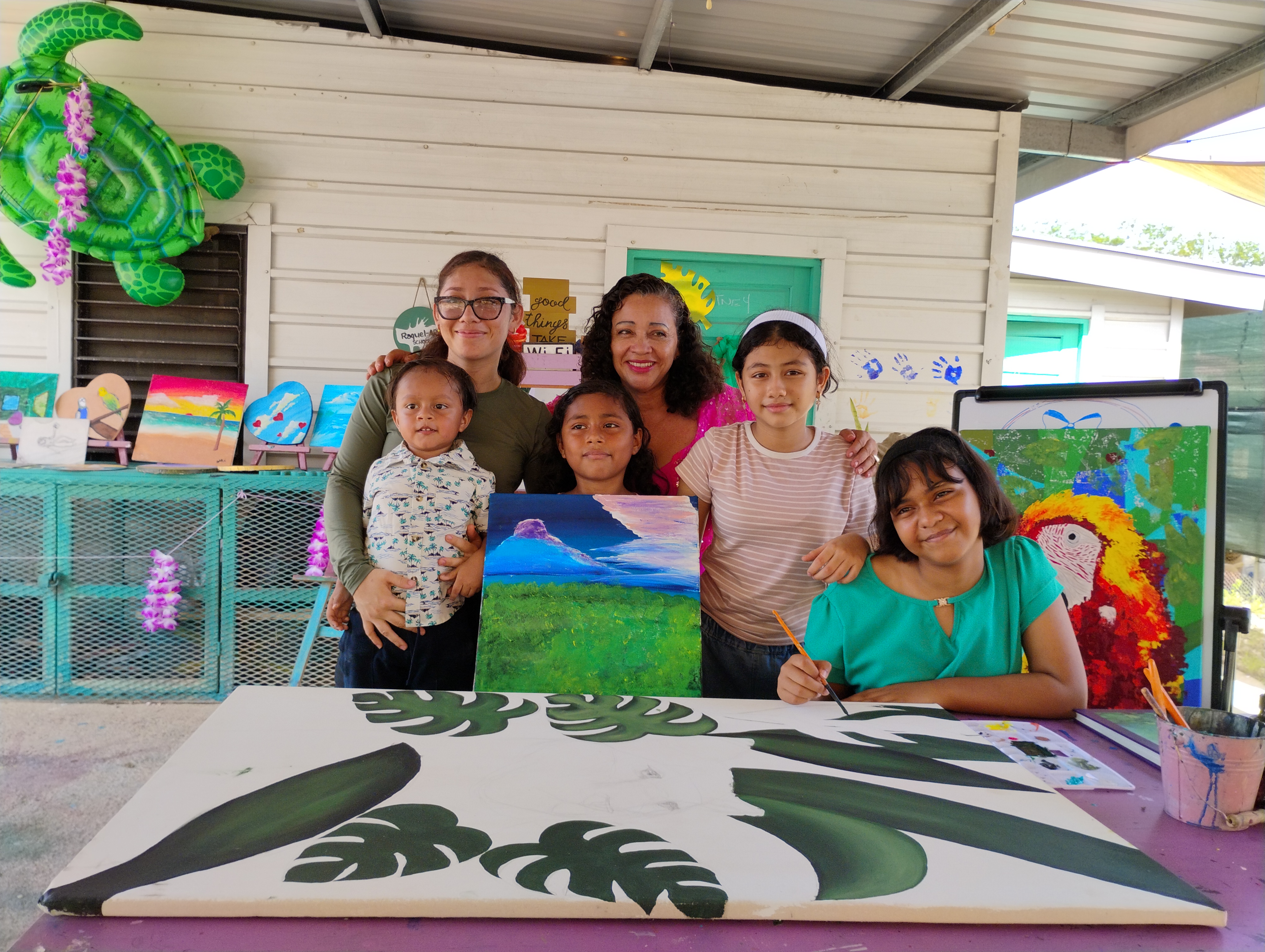 Darlin Polanco with family at Raquel Rodriguez Art